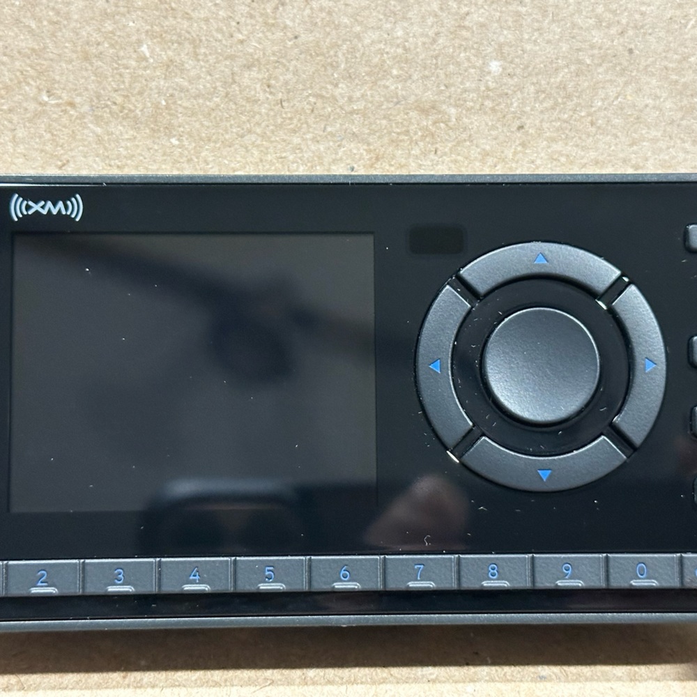Satellite radio kit includes radio/receiver, antenna, converter, dock